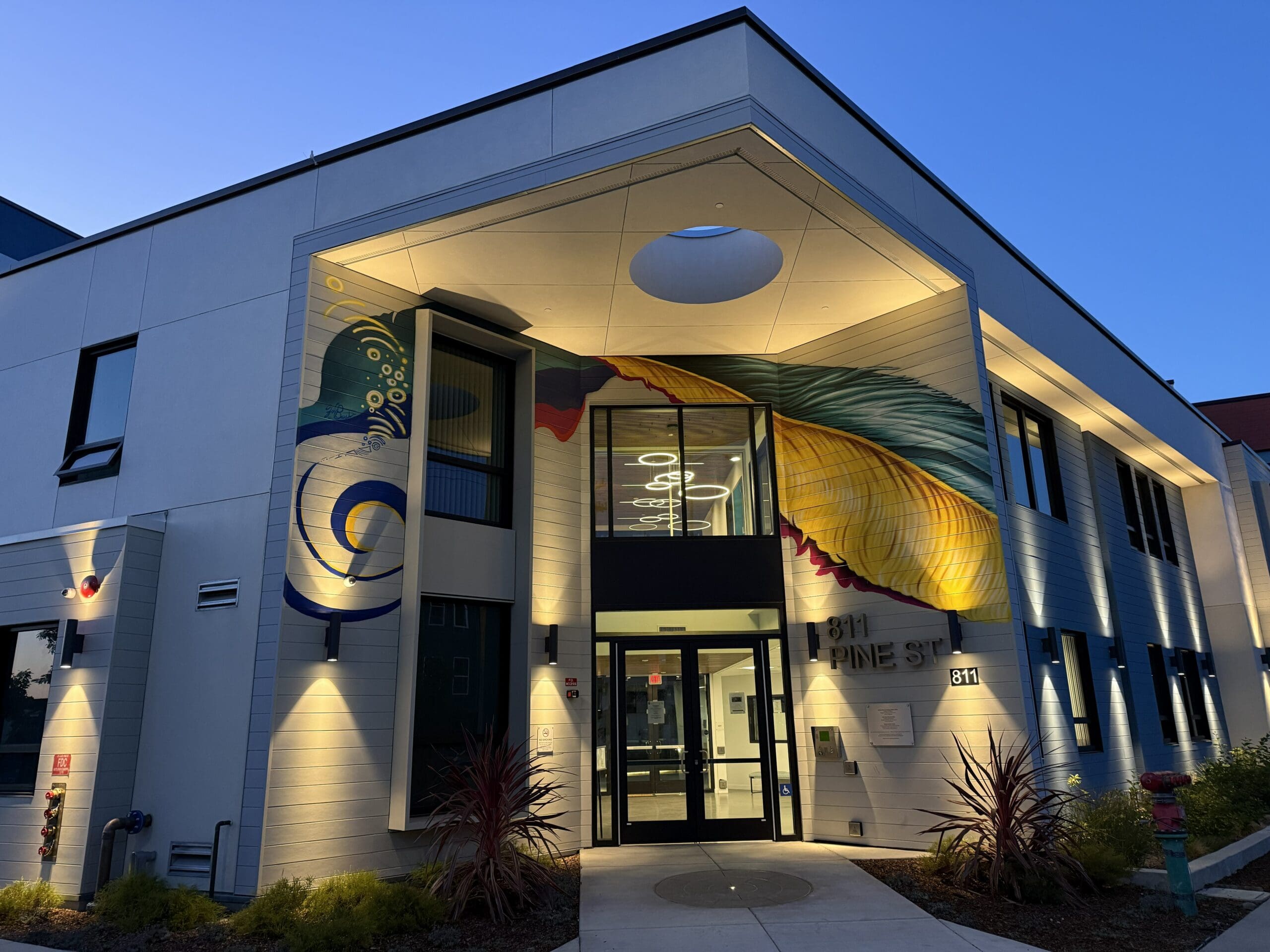 Illuminated entrance of contemporary building