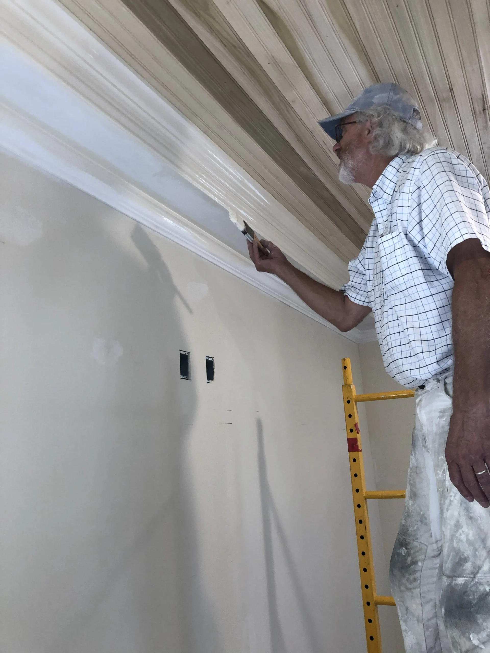 man doing painting